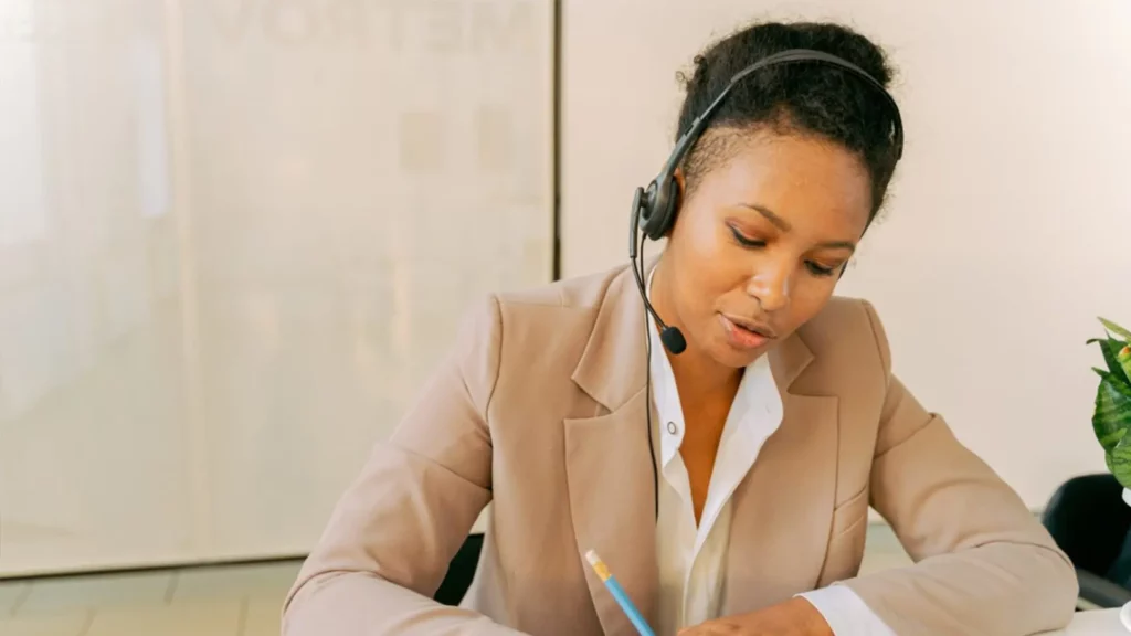 woman using phone headset
