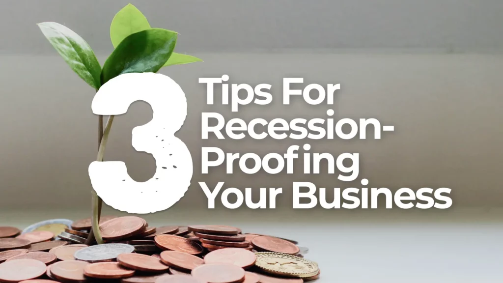 shoot growing from pile of coins