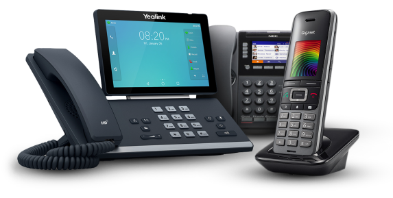 Three business telephones. two of them are desktop phones with digital displays and the third is a cordless phone on it's base station.