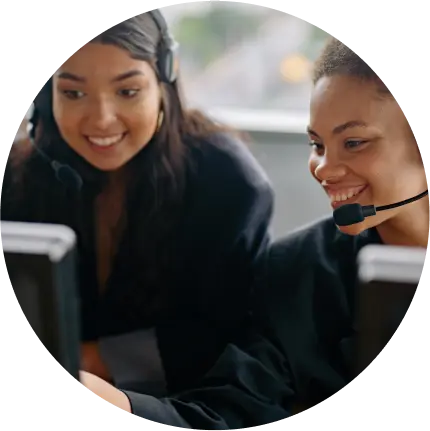 two ladies with headsets on