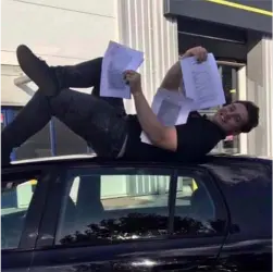Ryan on top of car
