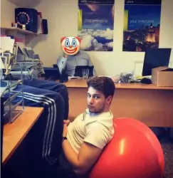 Ryan sitting on ball