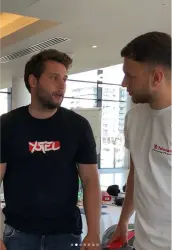 Ryan talking to colleague